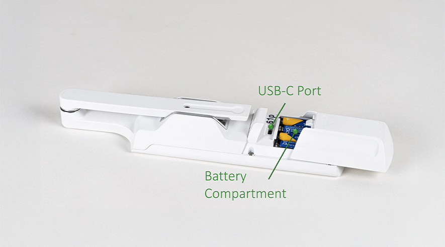 Battery compartment and USB-C port for data transfer.