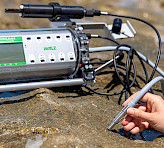 Measuring beachrock photosynthesis.